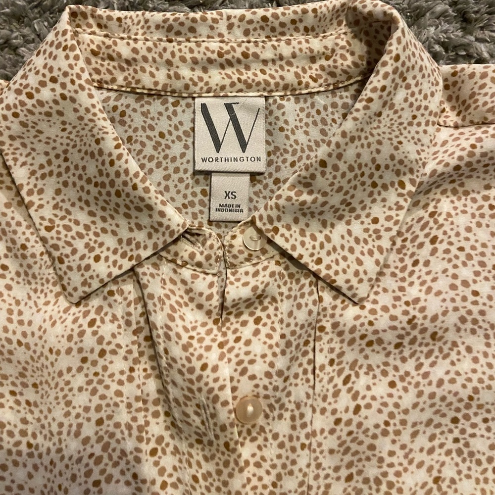 Sleeveless button down blouse